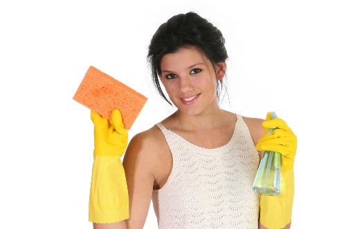 Local office cleaners in Canary Wharf tidying a modern corporate space