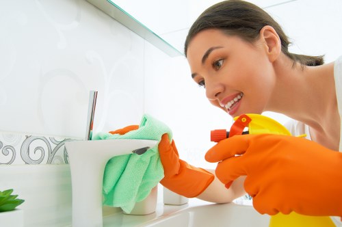 Trained worker using carpet cleaning equipment safely